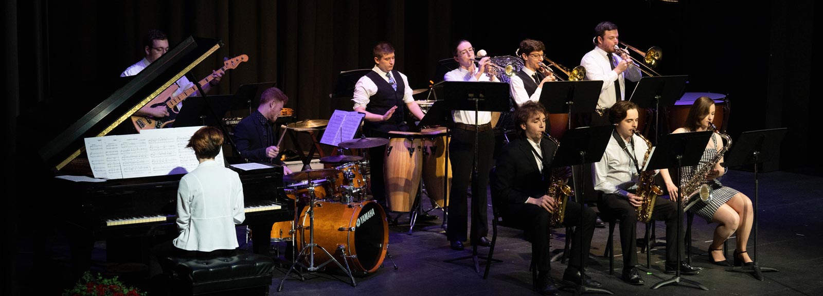 photo of the Jazz Ensemble playing instruments at a performance