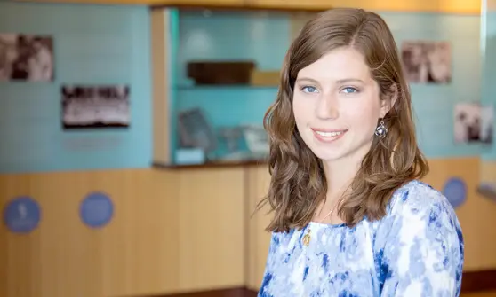 Portrait of a female student in library setting