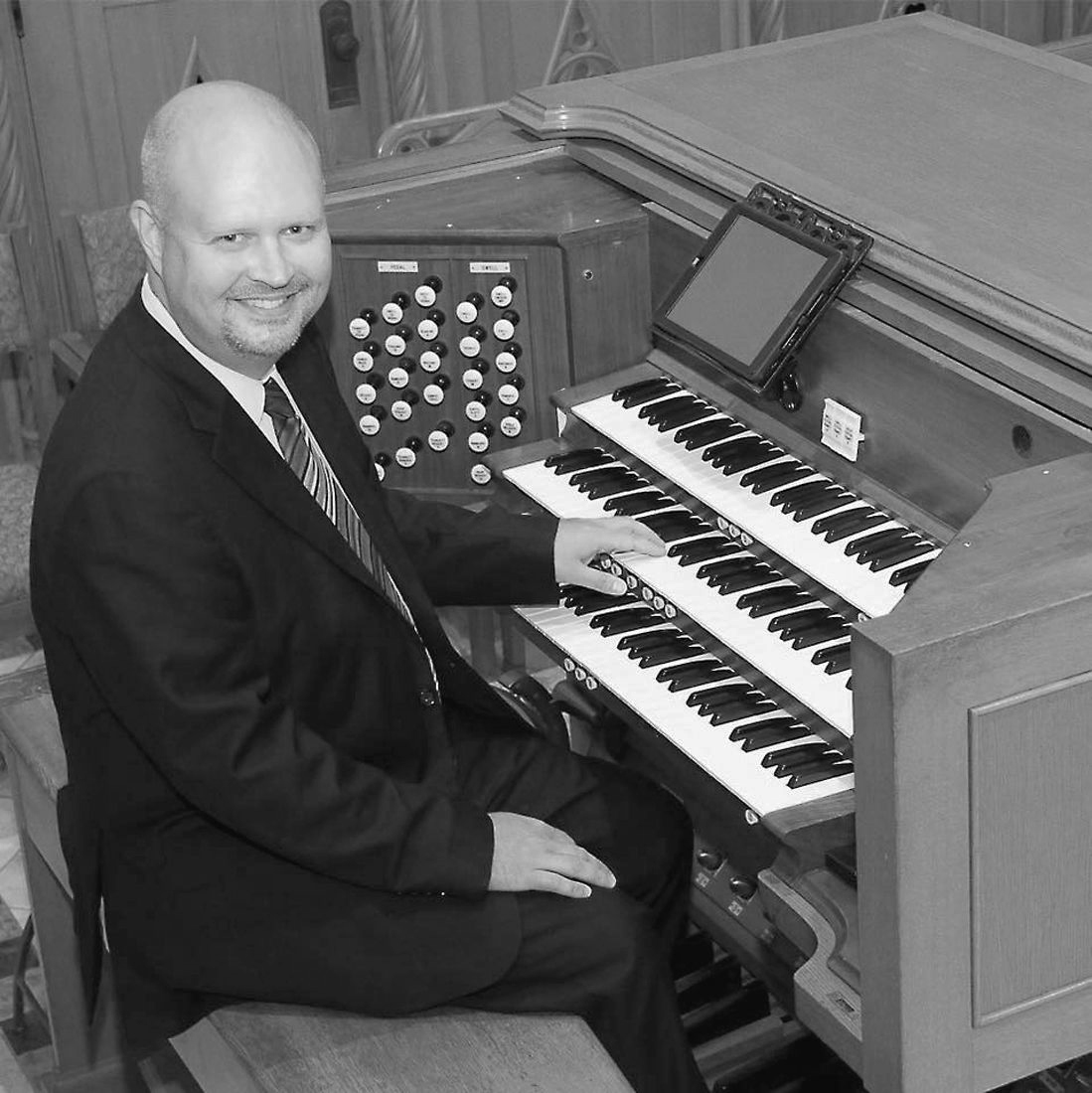 Christopher Pardini sitting at piano