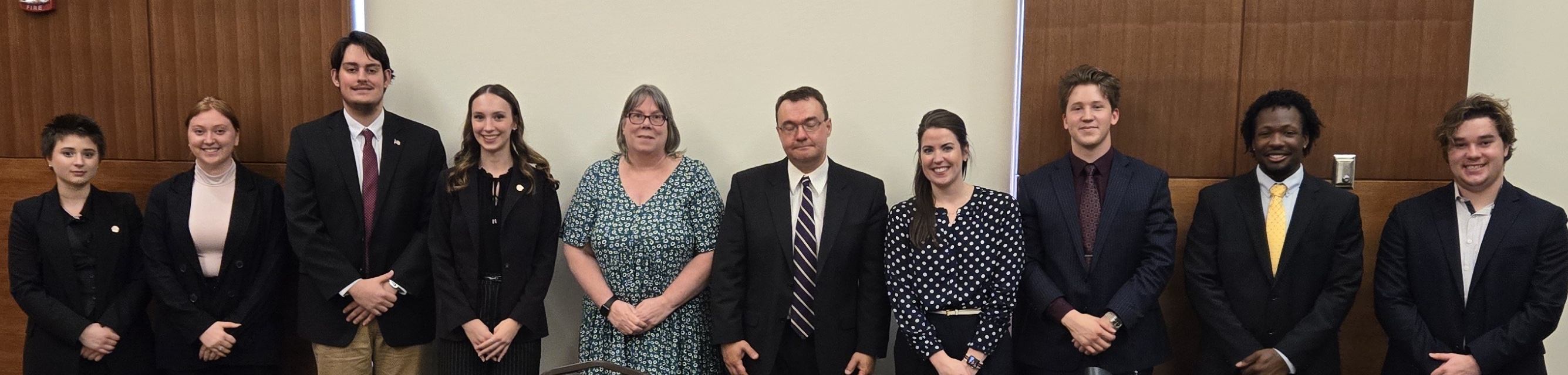 (From left) Sophia Bringman, Cera Hissem, Jacob Mock, Rebekah Bollman, Assistant General Counsel Eileen Flinn, attorney/adjunct professor Adam Cogan, Magisterial Judge Hon. Tamara Mahady, Caleb Banwar, J’Shawn Taylor and Anton Seifert