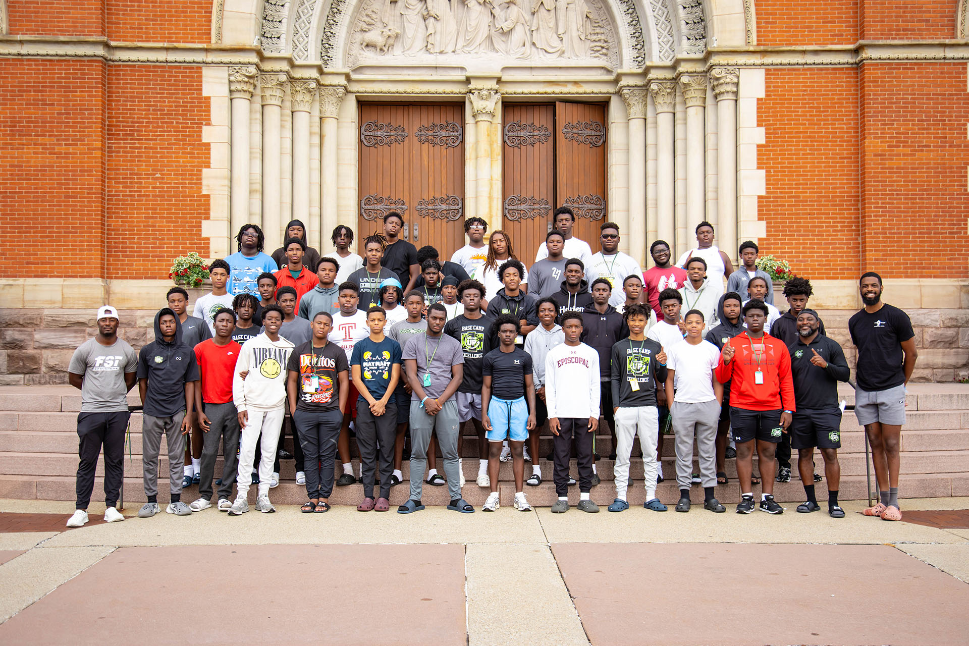 Kids from Next One Up summer campers pose outside the Saint Vincent Archabbey Basilica