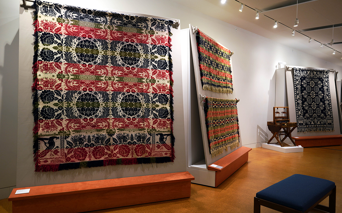 Coverlet display at the McCarl Gallery