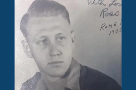 Black and white portrait of a young man in military uniform with medals, taken in 1945.